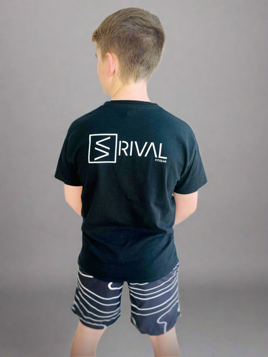 Back of child model wearing Legend Classic T Youth and Tidal Wave Shorts.