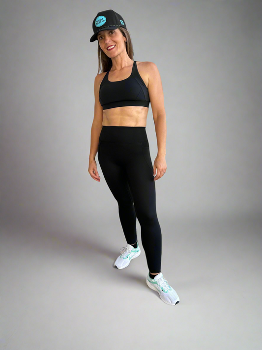 Model wearing Rival Fit Gear Ignite matching sportswear set.