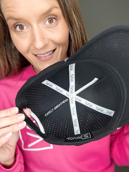 Model showcasing the inside of the Legacy hats.