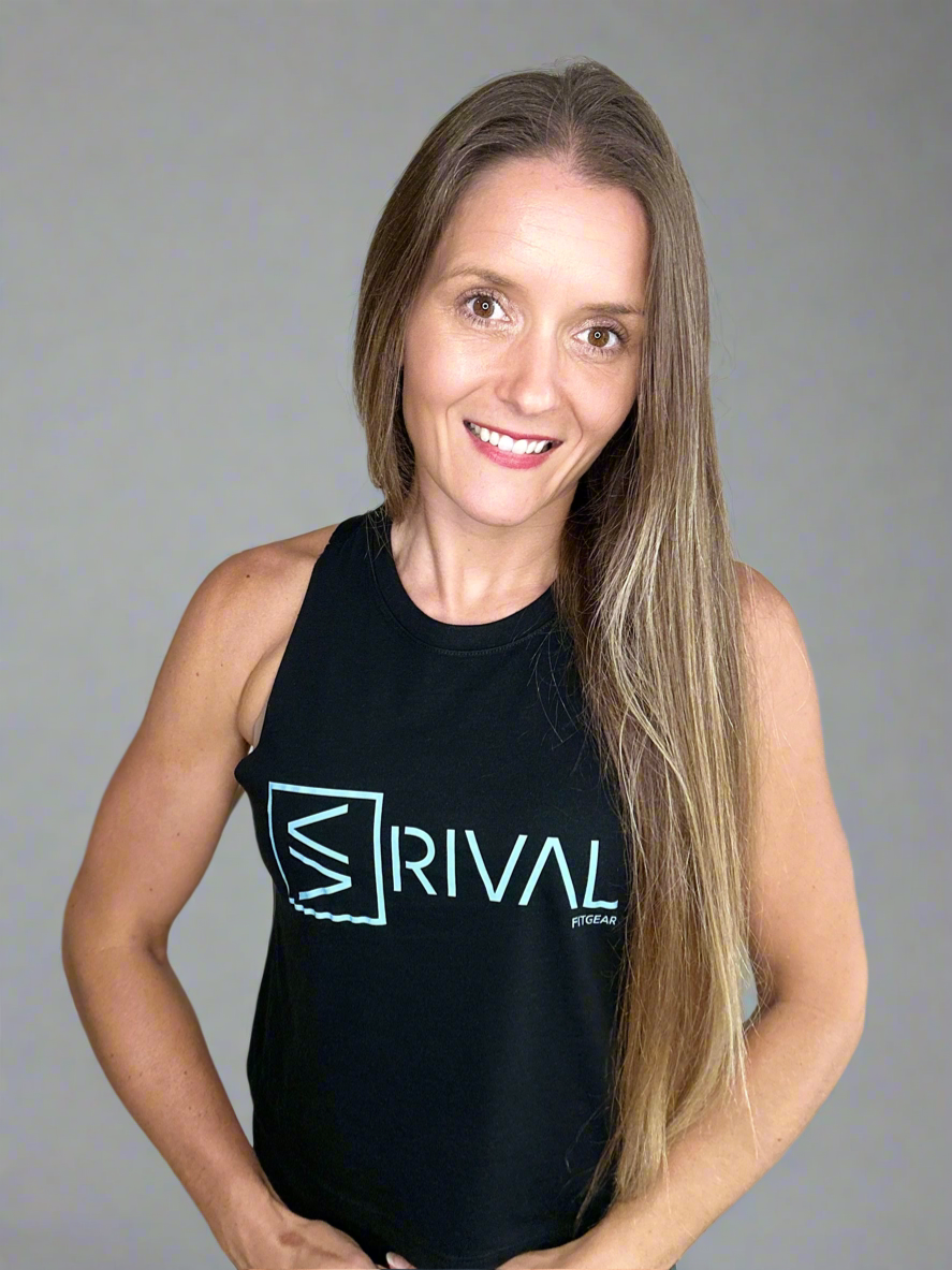 Female model wearing Legend Classic Crop Tank in Ocean Black.