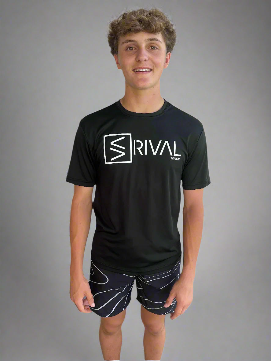 Male model wearing Legend Classic Performance T and Tidal Wave Shorts by Rival Fit Gear.