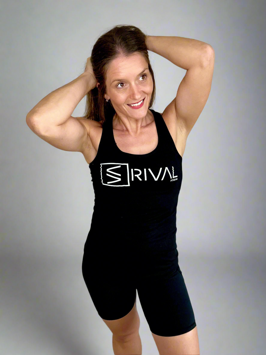 Female model wearing Legend Classic Racerback tank.