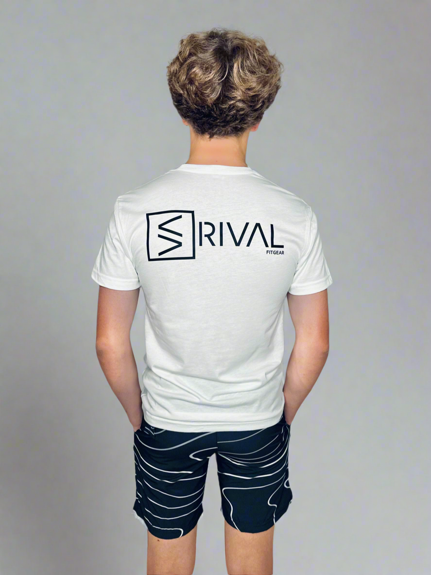 Back side of male model wearing Legend Classic T and Tidal Wave Shorts.