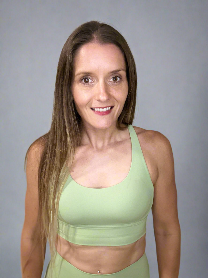 Front of Powerflow Axis Bra in Mint.