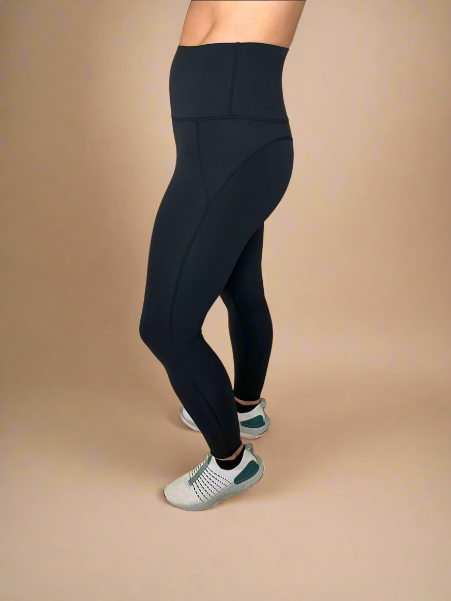Side photo of Powerflow Leggings in Black.
