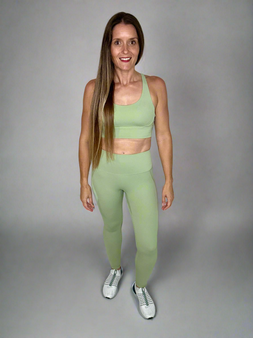 Female model wearing Powerflow Workout Set in Mint.