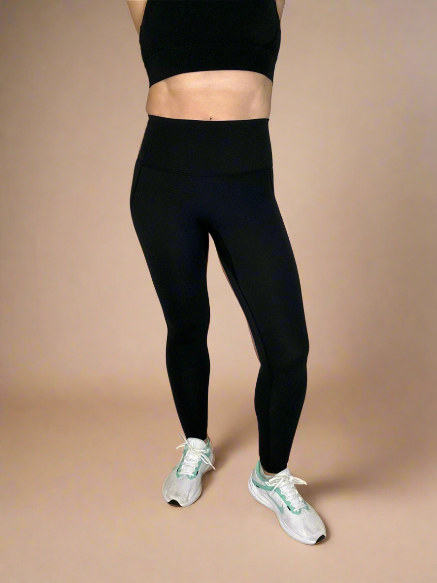 Front of Powerflow Leggings in Black.