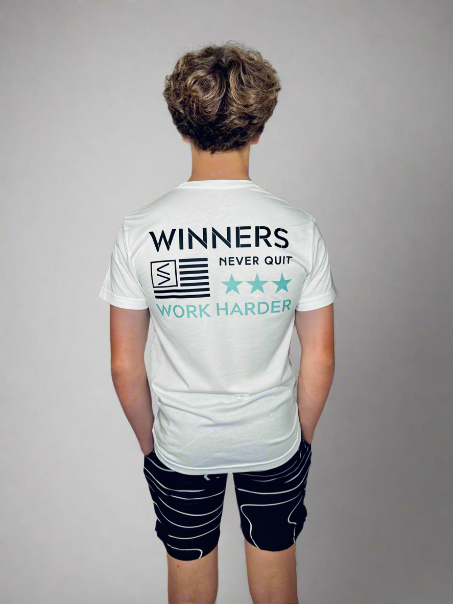 Male backside showcasing Winners Work Harder T and Tidal Wave Shorts.