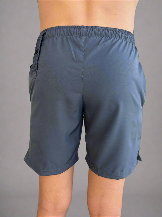 Back of man wearing Graphite Performance Shorts.