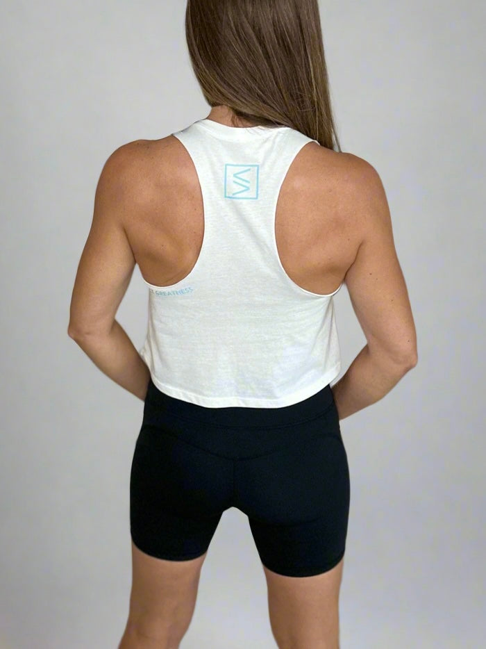 Back if female model wearing Legend Classic Crop Tank in Ocean White. 