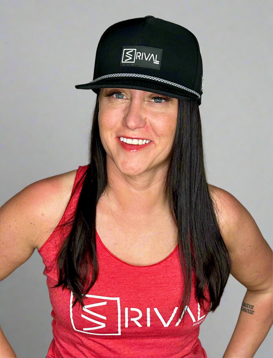 Female model wearing Legacy Curve brim hat with details and wearing a Rival Fit Gear tank top.