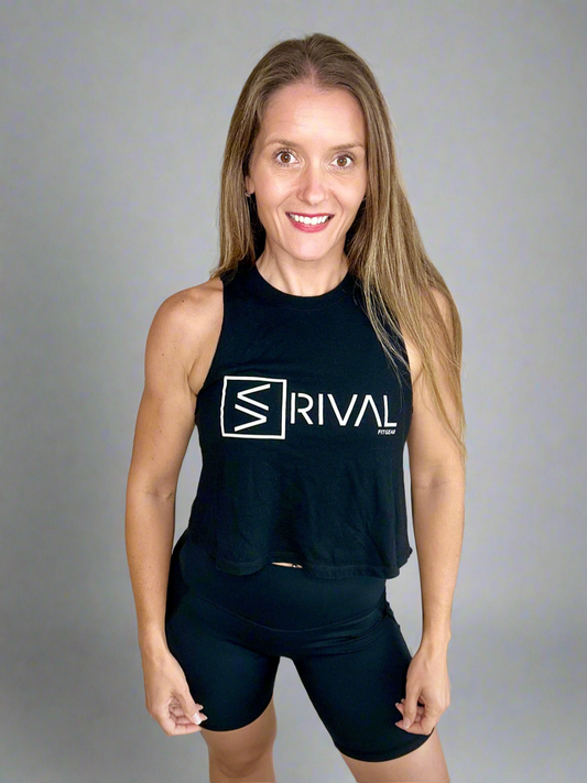 Female model wearing Legend Classic Crop Tank in black.