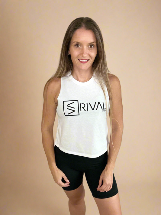 Femal model wearing Legend Classic Crop Tank in white. 