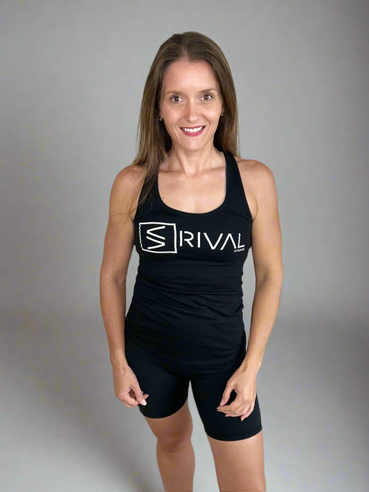 Female model wearing Legend Classic Racerback Tank in Black.