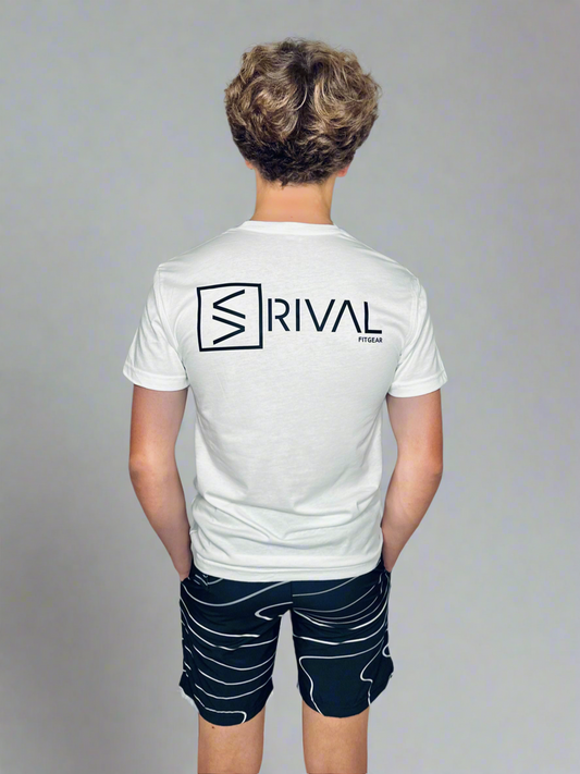 Back side of male model wearing Legend Classic T and Tidal Wave Shorts.
