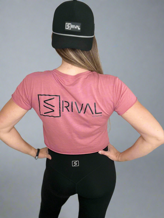 The GOAT crop tee in mauve back side.